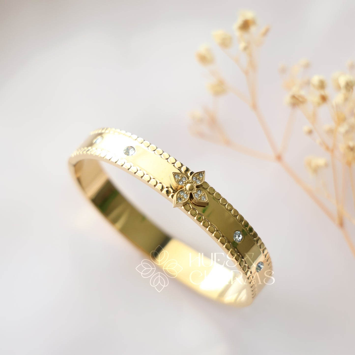GOLDEN STATEMENT FLORAL BRACELET