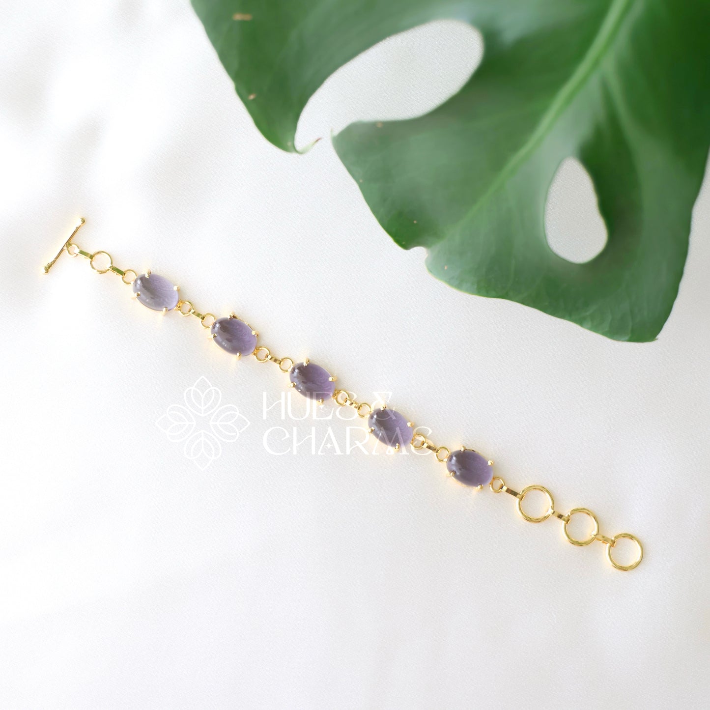 GOLDEN OVAL SHAPE STONE ADJUSTABLE BRACELET (COLOURS AVAILABLE)