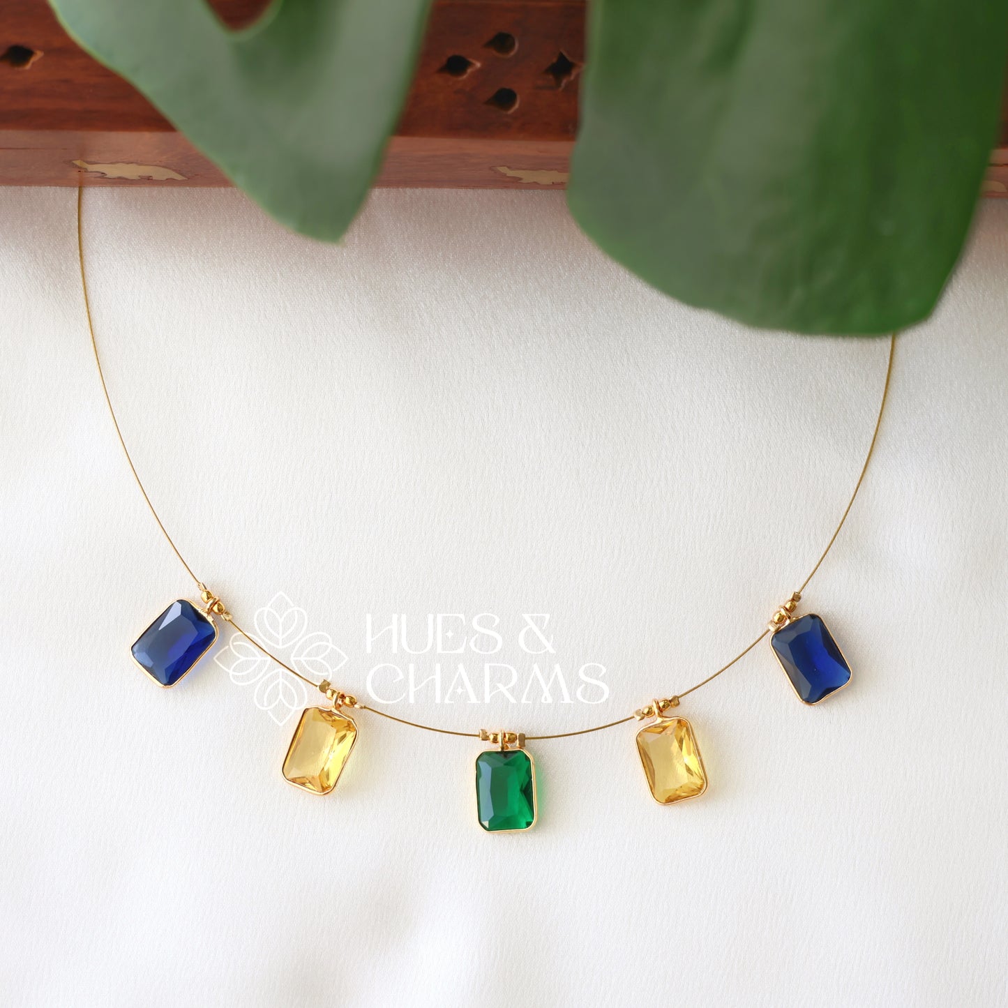 GLOSSY DROP FLOATING NECKPIECE (COLOURS AVAILABLE)