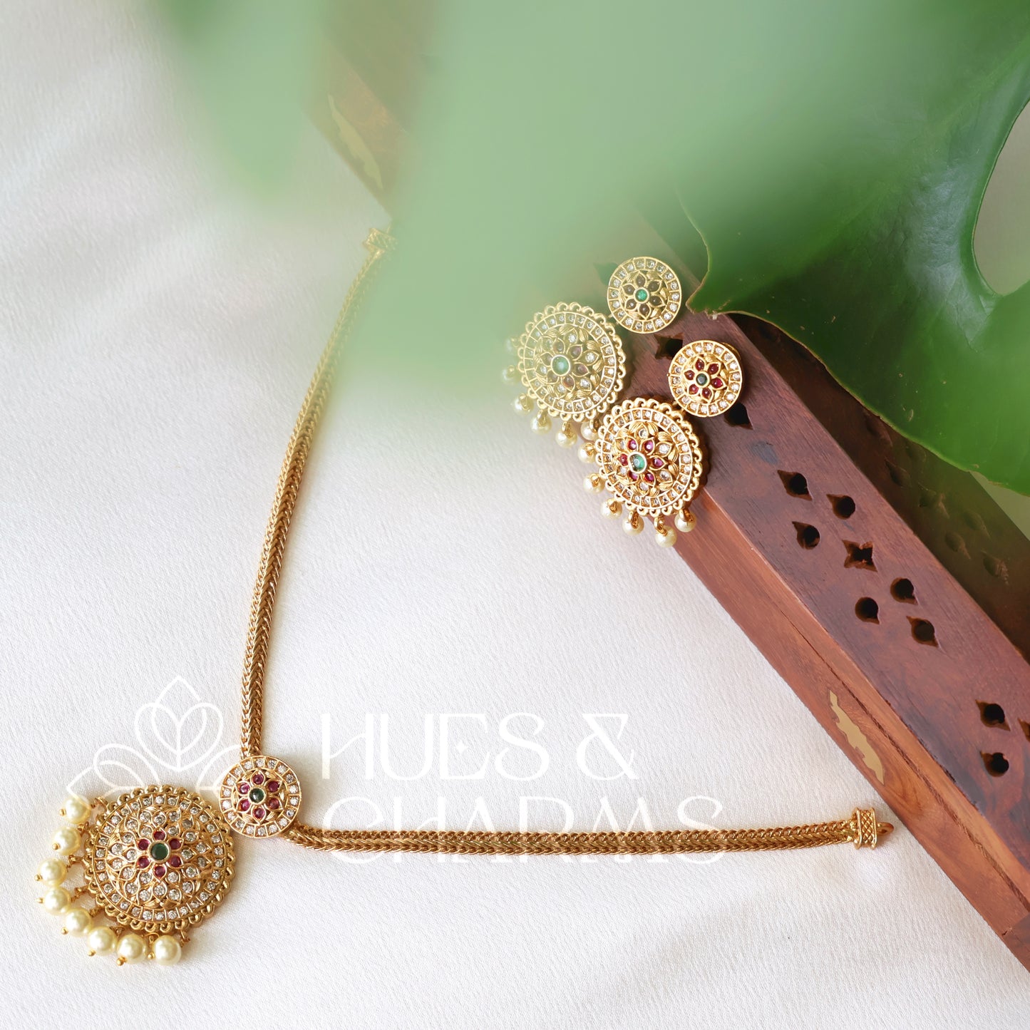 GOLDEN PUSHPA ATTIGAI NECKLACE SET