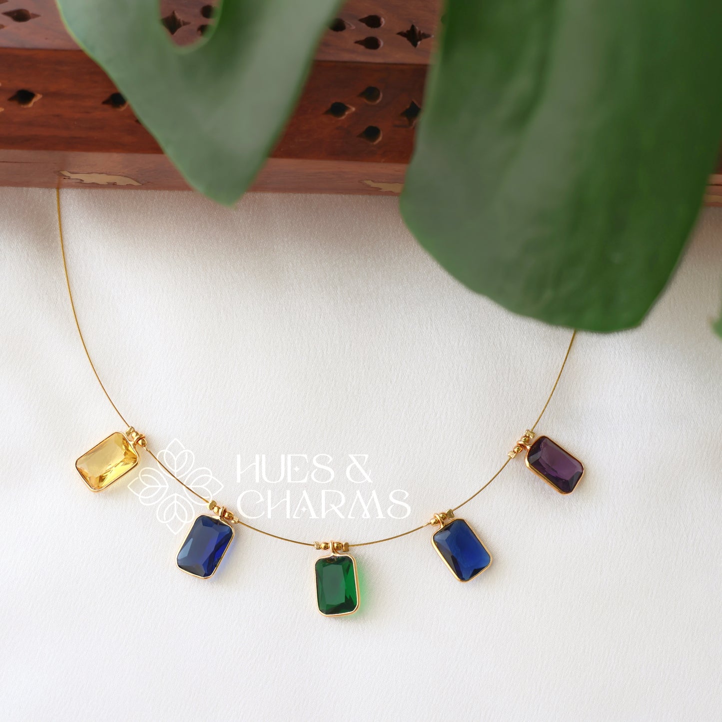 GLOSSY DROP FLOATING NECKPIECE (COLOURS AVAILABLE)