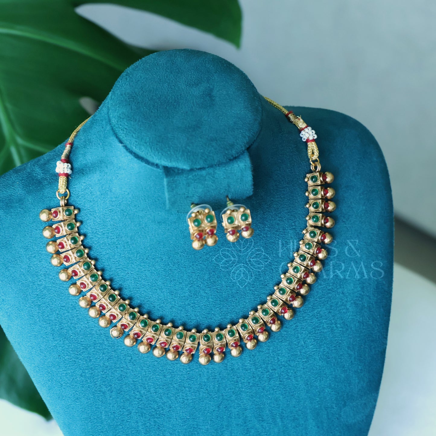 GOLDEN VARNIKA RUBY AND GREEN NECKLACE SET