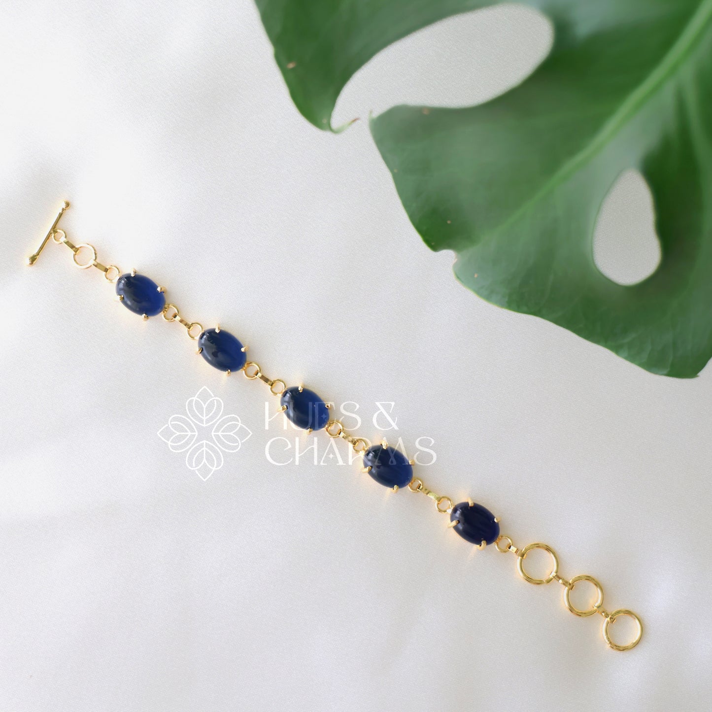 GOLDEN OVAL SHAPE STONE ADJUSTABLE BRACELET (COLOURS AVAILABLE)