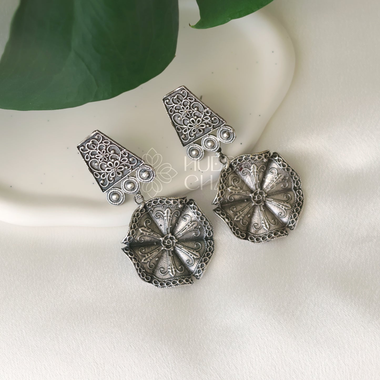 OXIDIZED TEXTURED FLORAL DROP WITH SELF DETAILING EARRINGS