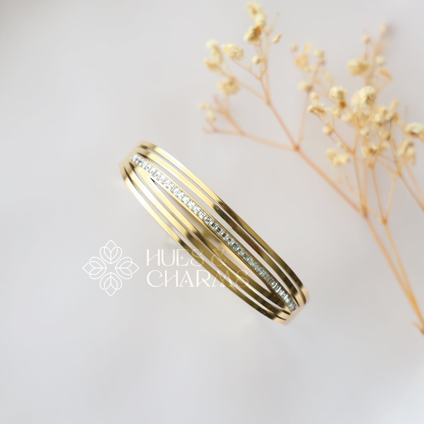 GOLDEN SIX LAYER AD STATEMENT BRACELET