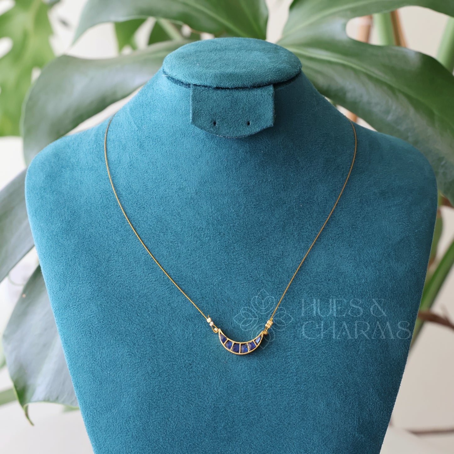 MINIMAL HALF MOON FLOATING NECKPIECE (COLOURS AVAILABLE)