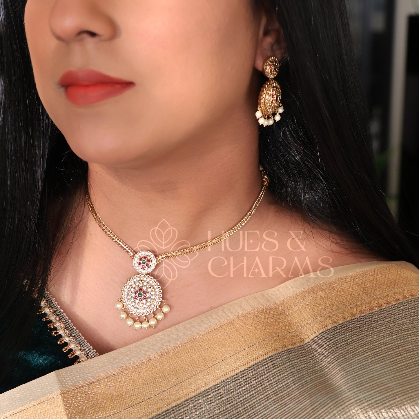 GOLDEN PUSHPA ATTIGAI NECKLACE SET