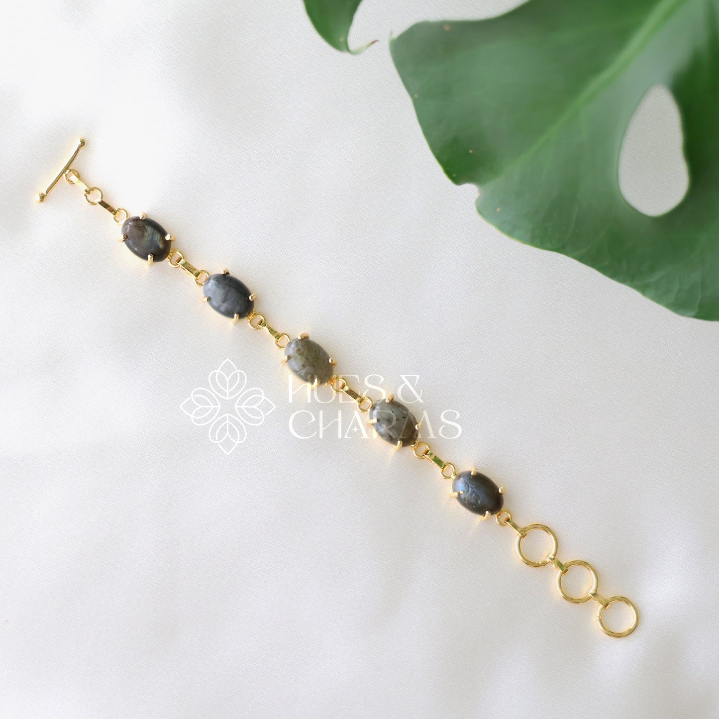 GOLDEN OVAL SHAPE STONE ADJUSTABLE BRACELET (COLOURS AVAILABLE)