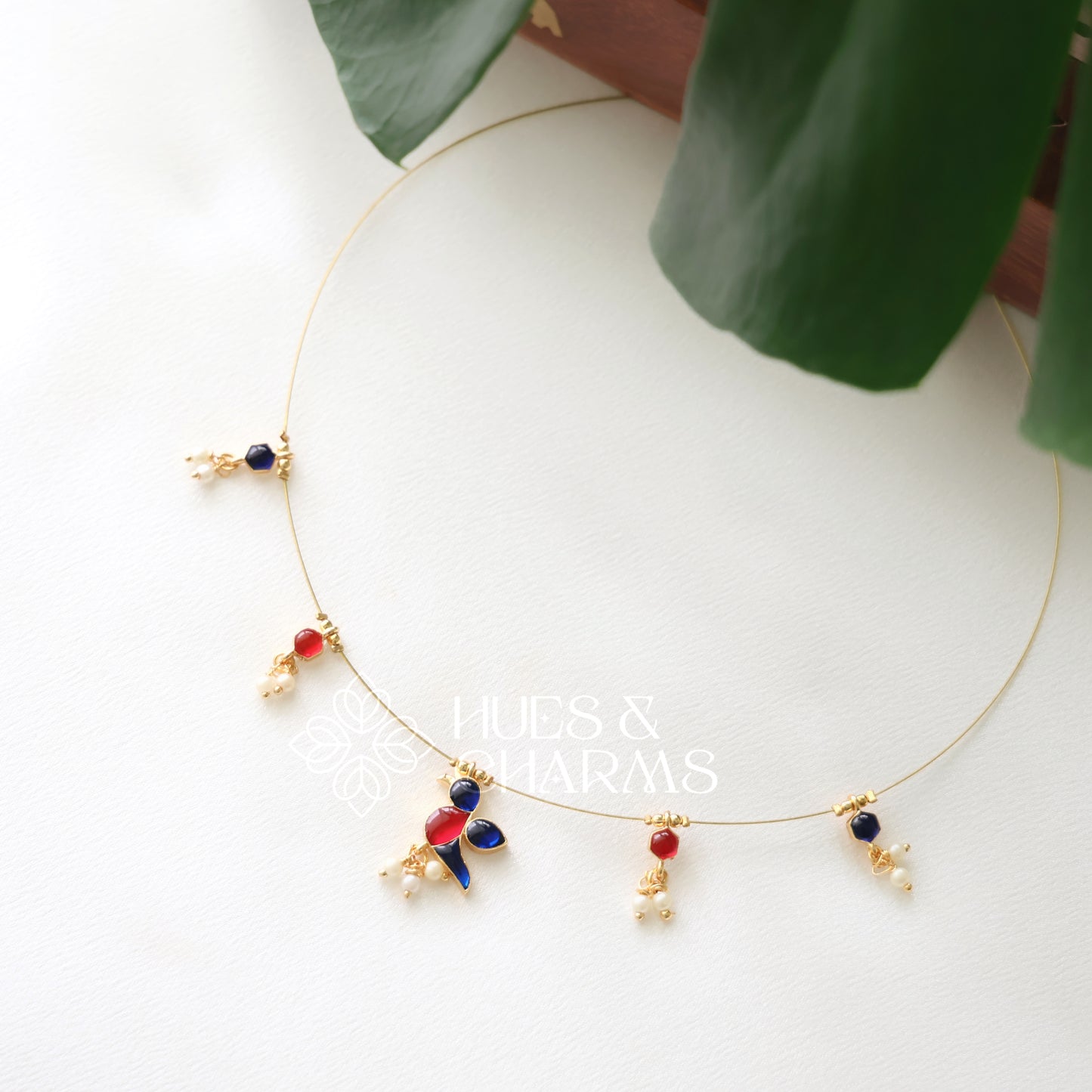 PARROT FLOATING NECKPIECE -BLUE & PINK