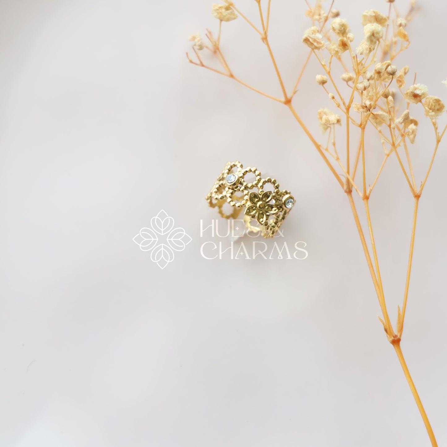 GOLDEN FLORA STATEMENT ADJUSTABLE RING