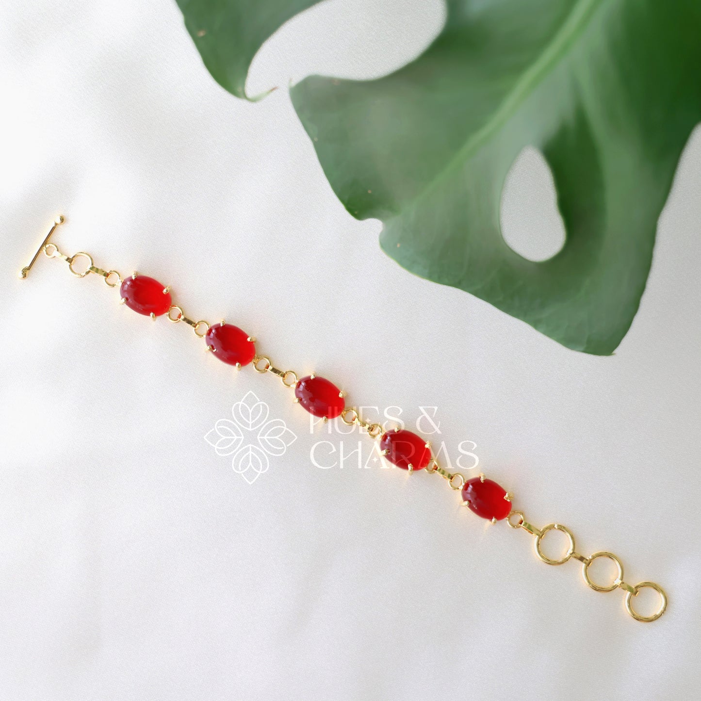 GOLDEN OVAL SHAPE STONE ADJUSTABLE BRACELET (COLOURS AVAILABLE)