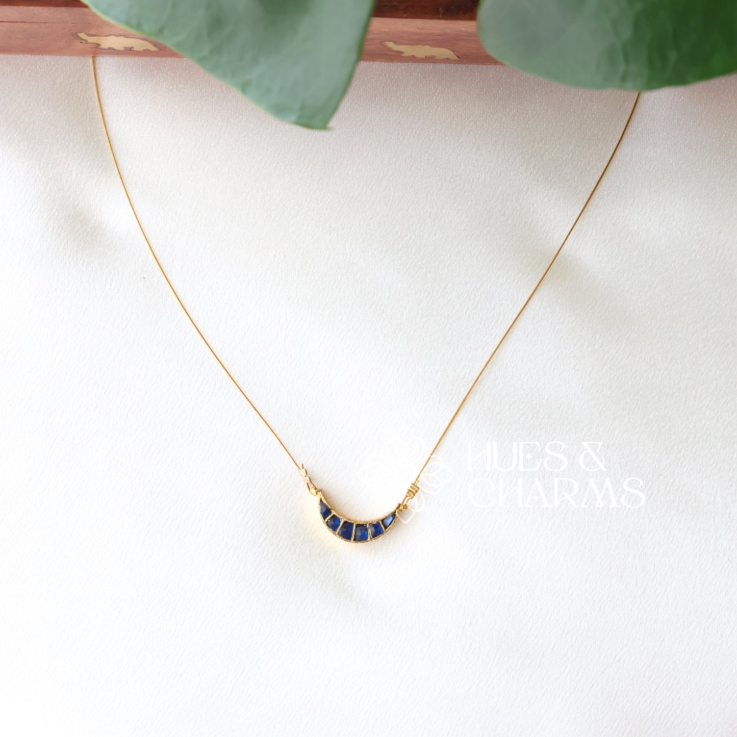 MINIMAL HALF MOON FLOATING NECKPIECE (COLOURS AVAILABLE)