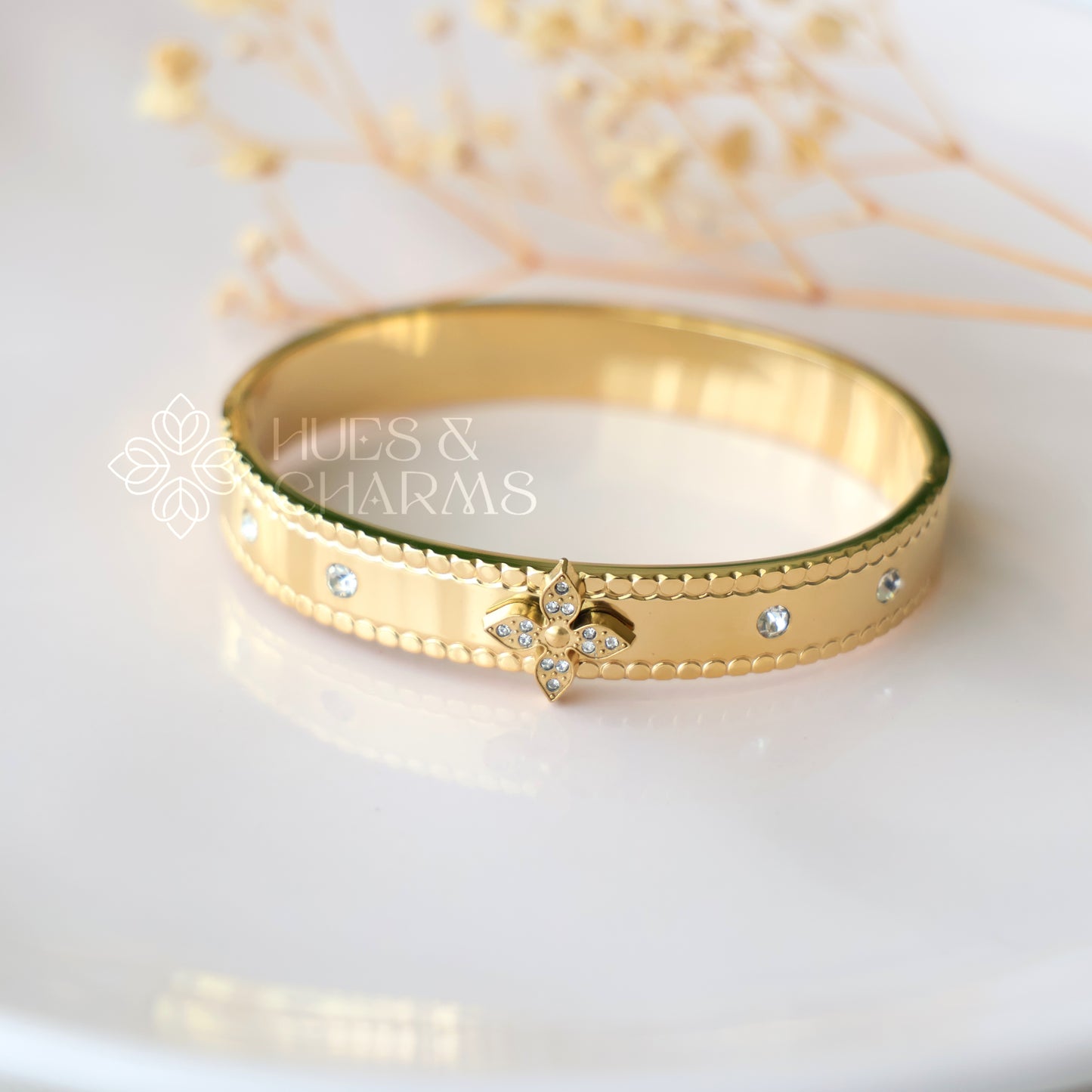 GOLDEN STATEMENT FLORAL BRACELET