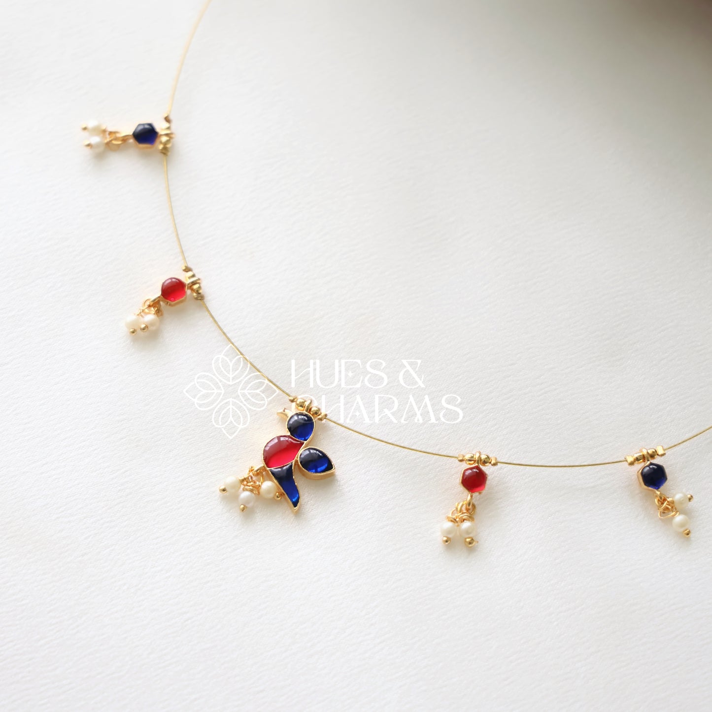PARROT FLOATING NECKPIECE -BLUE & PINK