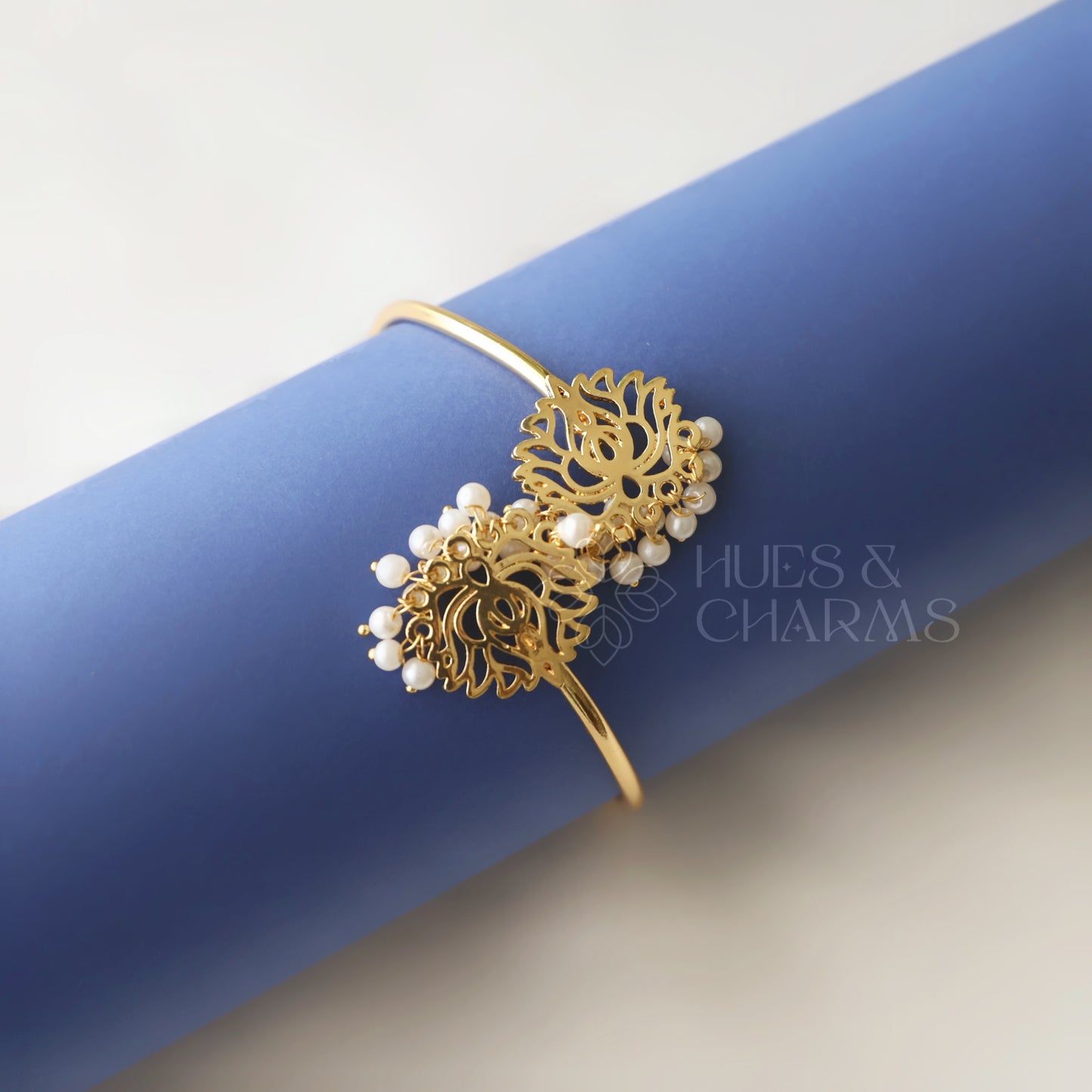 GOLDEN ADJUSTABLE LOTUS BANGLE WITH PEARLS