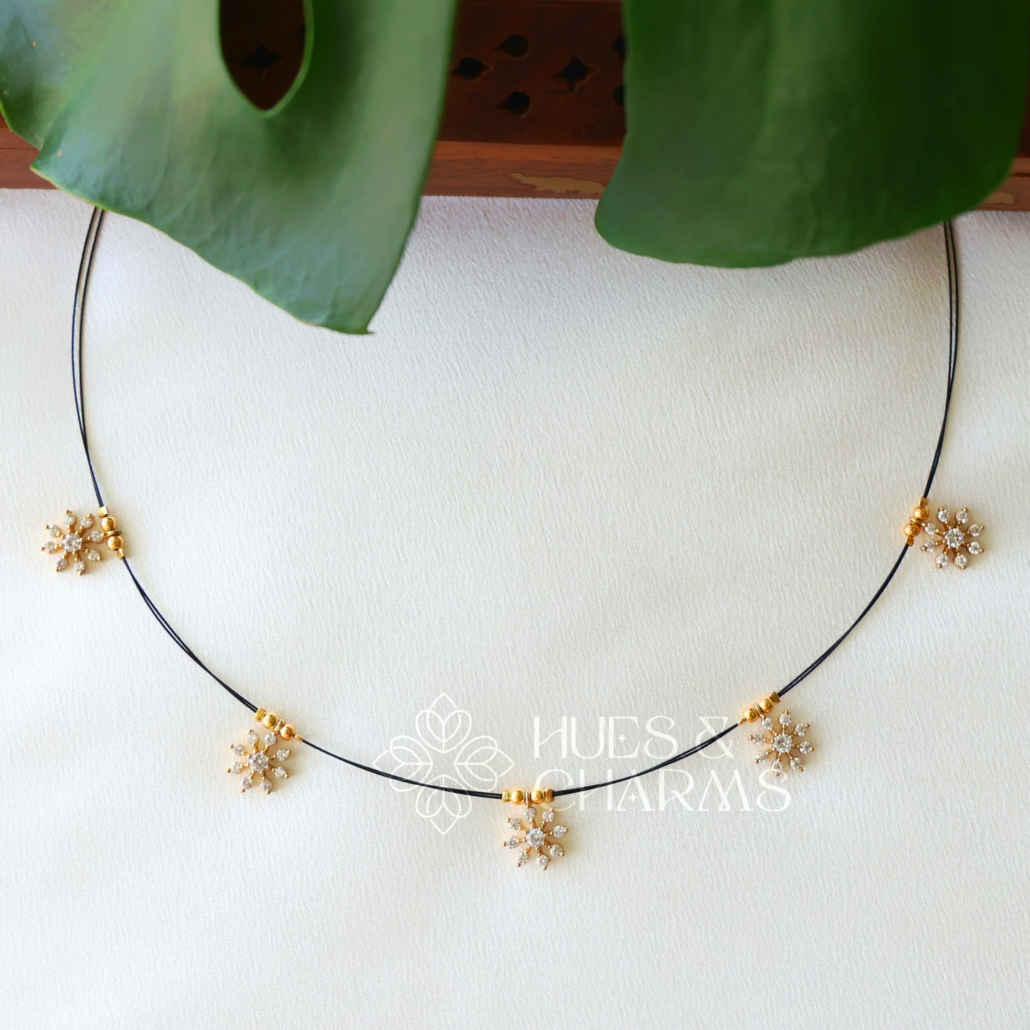 WHITE 5 SNOWFLAKES FLOATING NECKPIECE (BLACK EDITION)