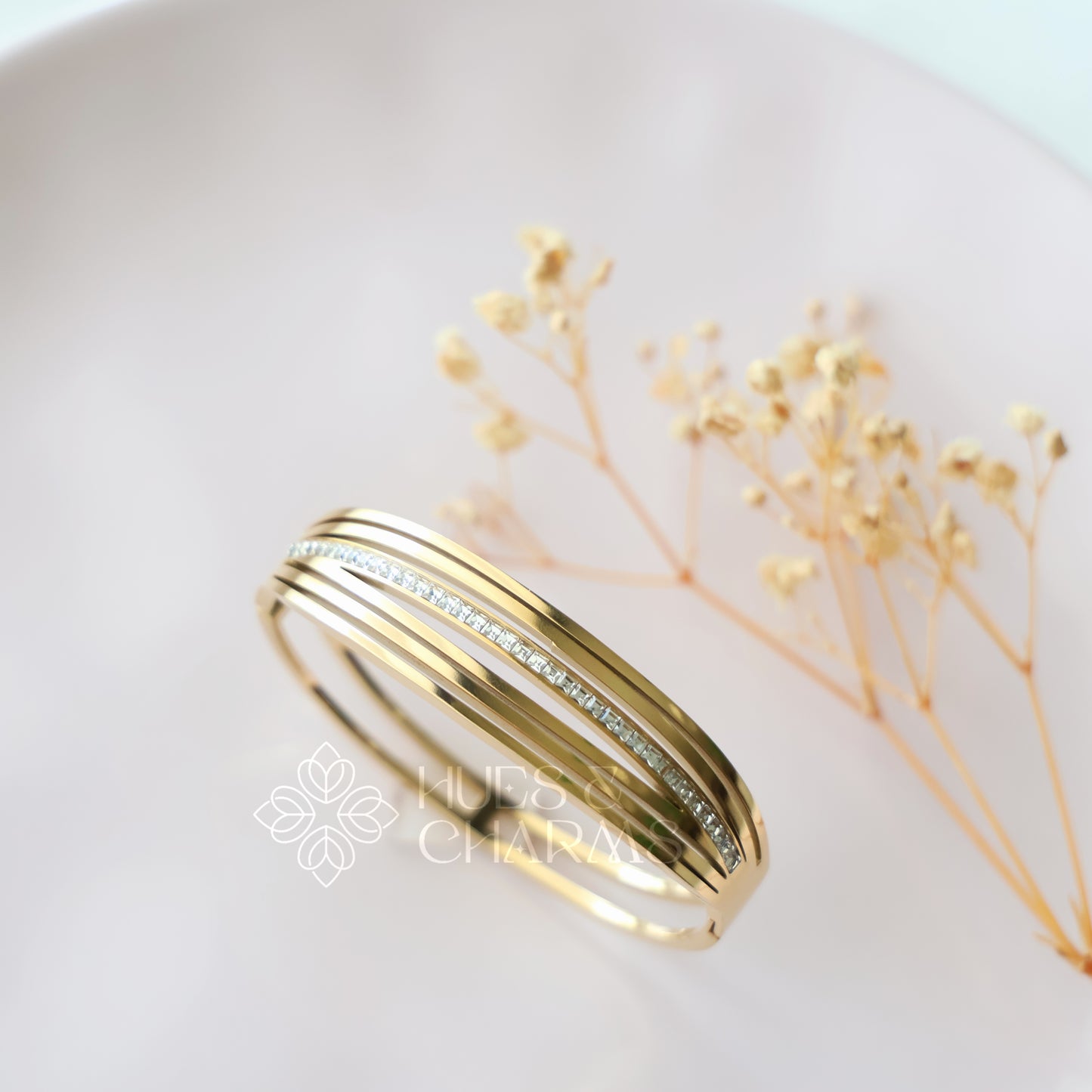 GOLDEN SIX LAYER AD STATEMENT BRACELET