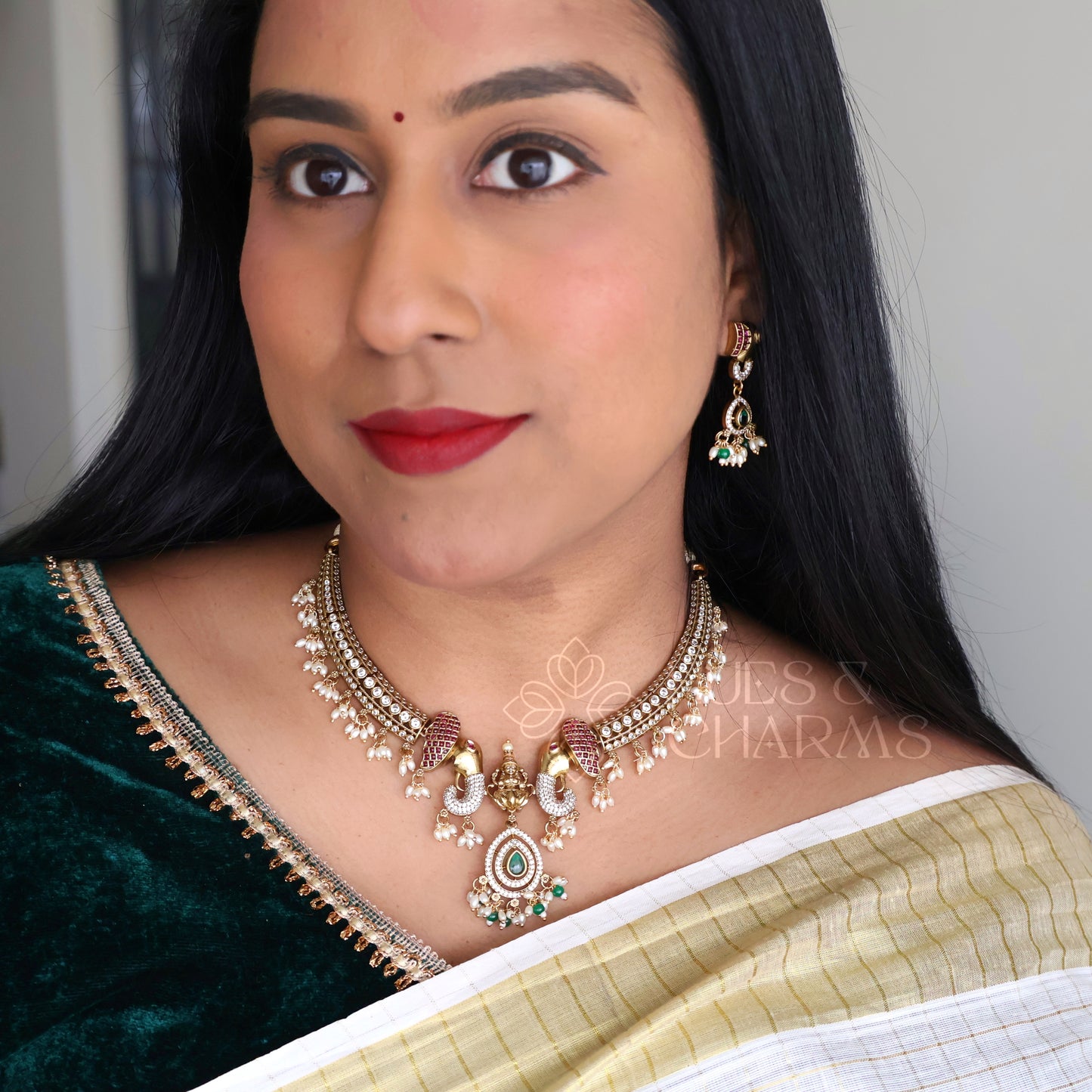 GOLDEN HERITAGE LAKSMI DETAILED STATEMENT NECKLACE SET WITH PEARLS
