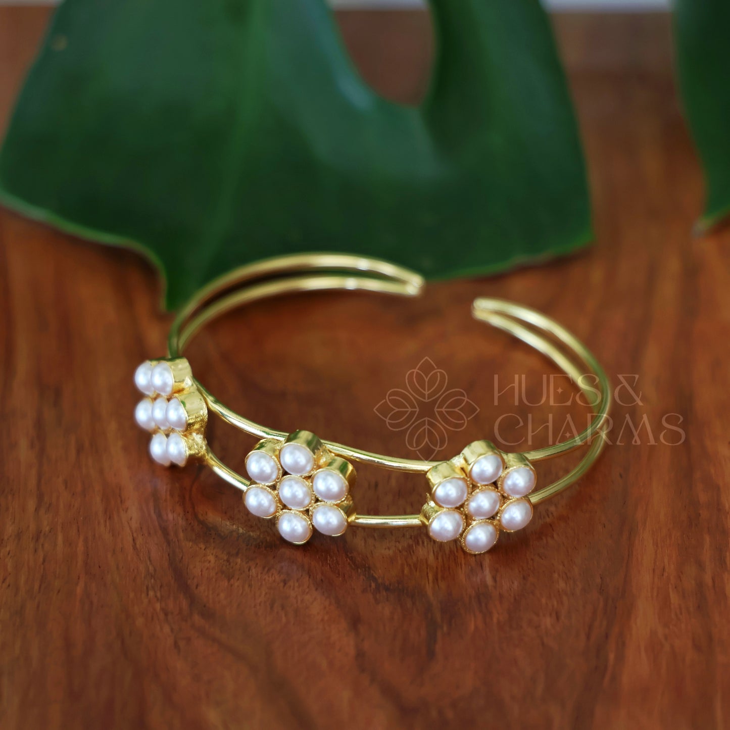 GOLDEN 3 FLORAL PEARL ADJUSTABLE BANGLE