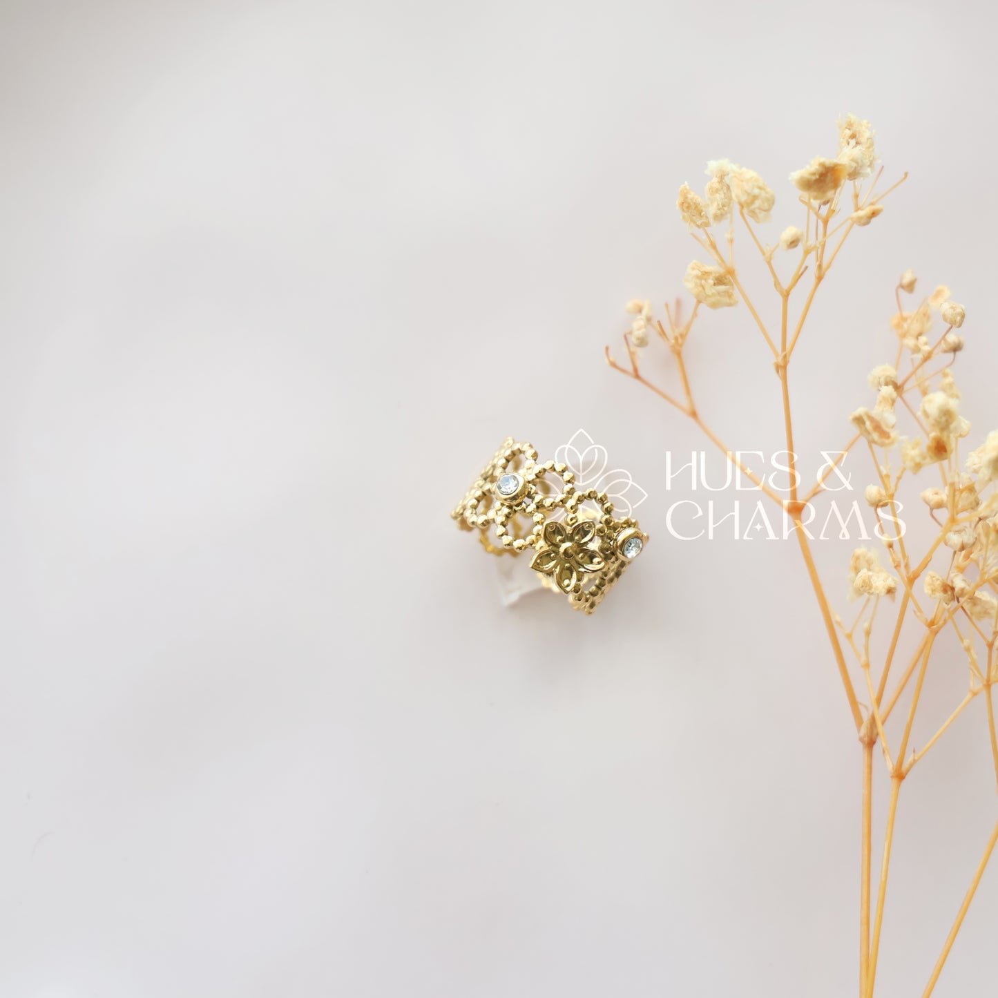GOLDEN FLORA STATEMENT ADJUSTABLE RING