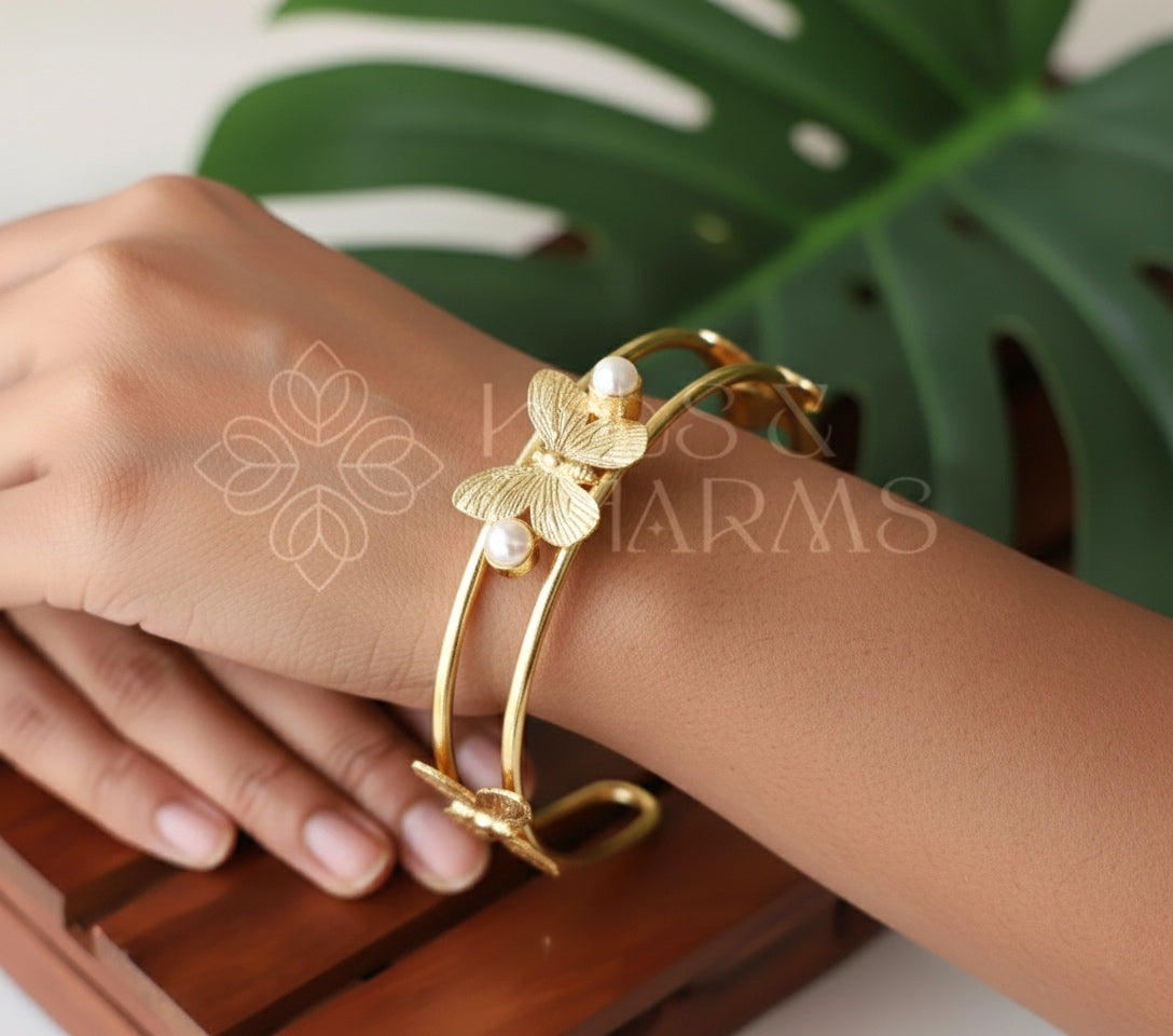 GOLDEN ADJUSTABLE BUTTERFLY BANGLE WITH PEARLS