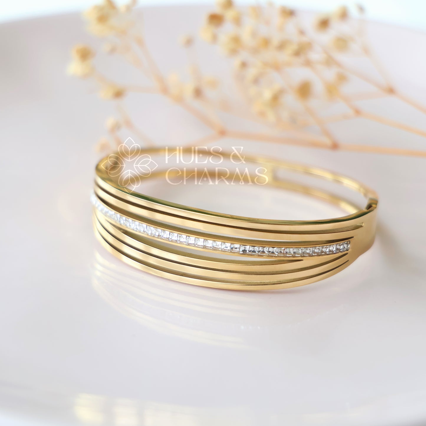 GOLDEN SIX LAYER AD STATEMENT BRACELET