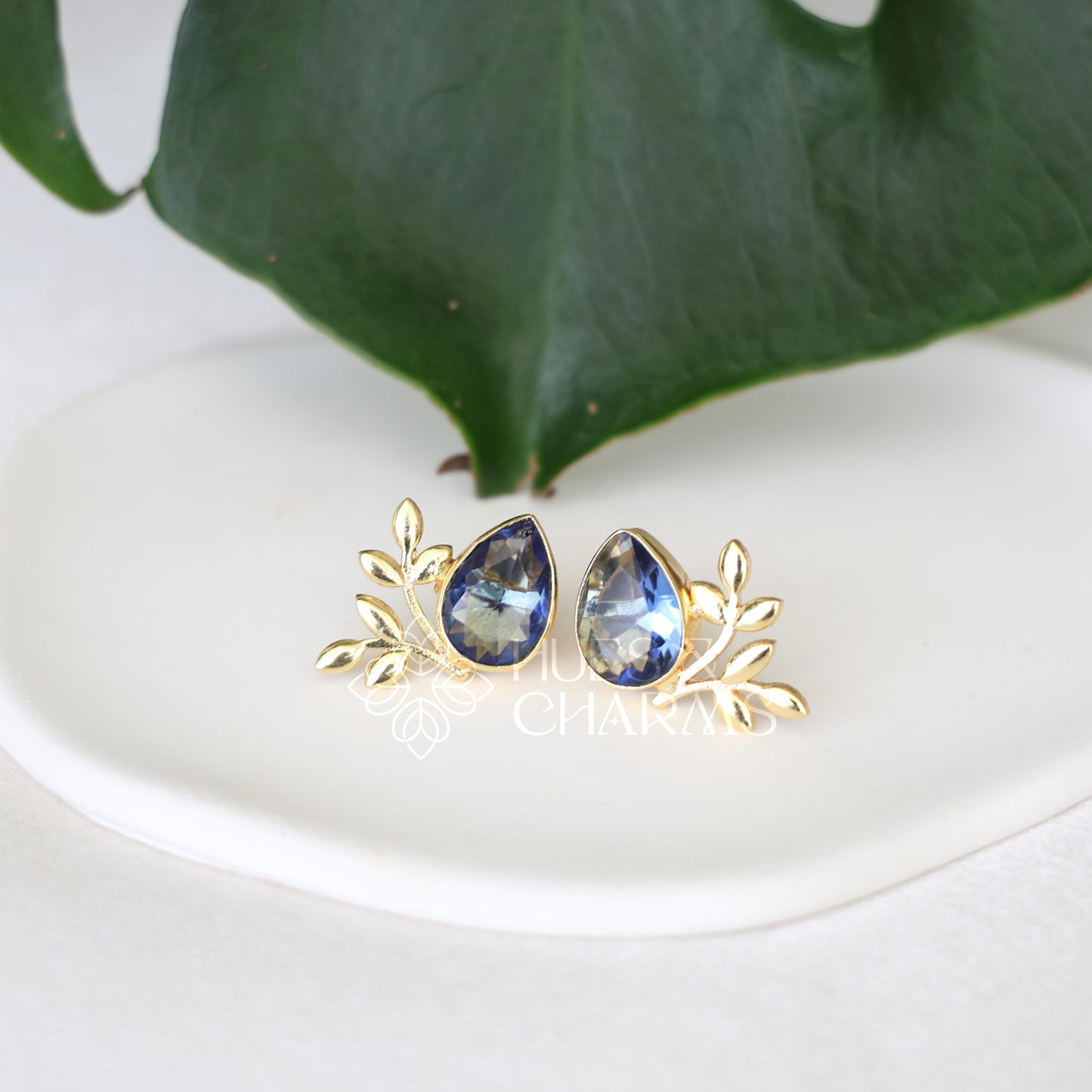 GOLDEN GLOSSY FLORA STUDS