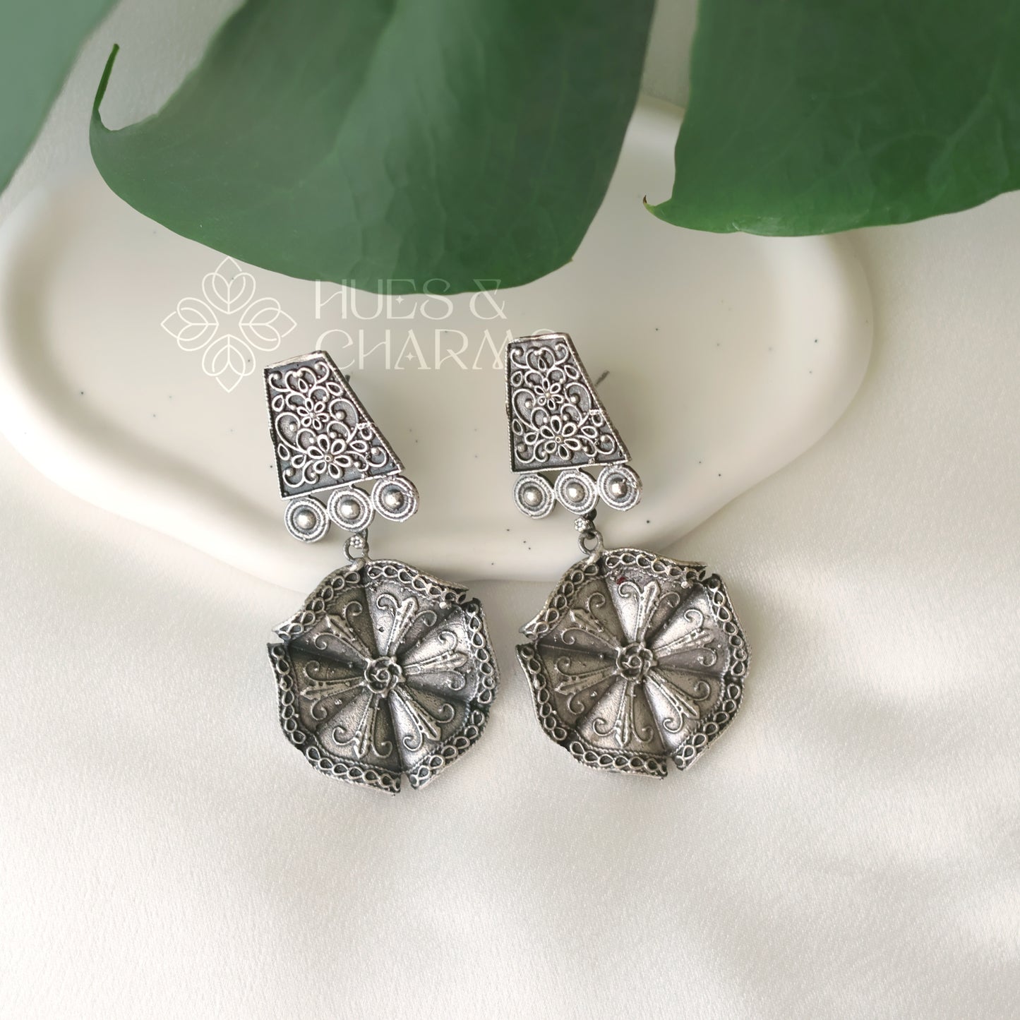 OXIDIZED TEXTURED FLORAL DROP WITH SELF DETAILING EARRINGS