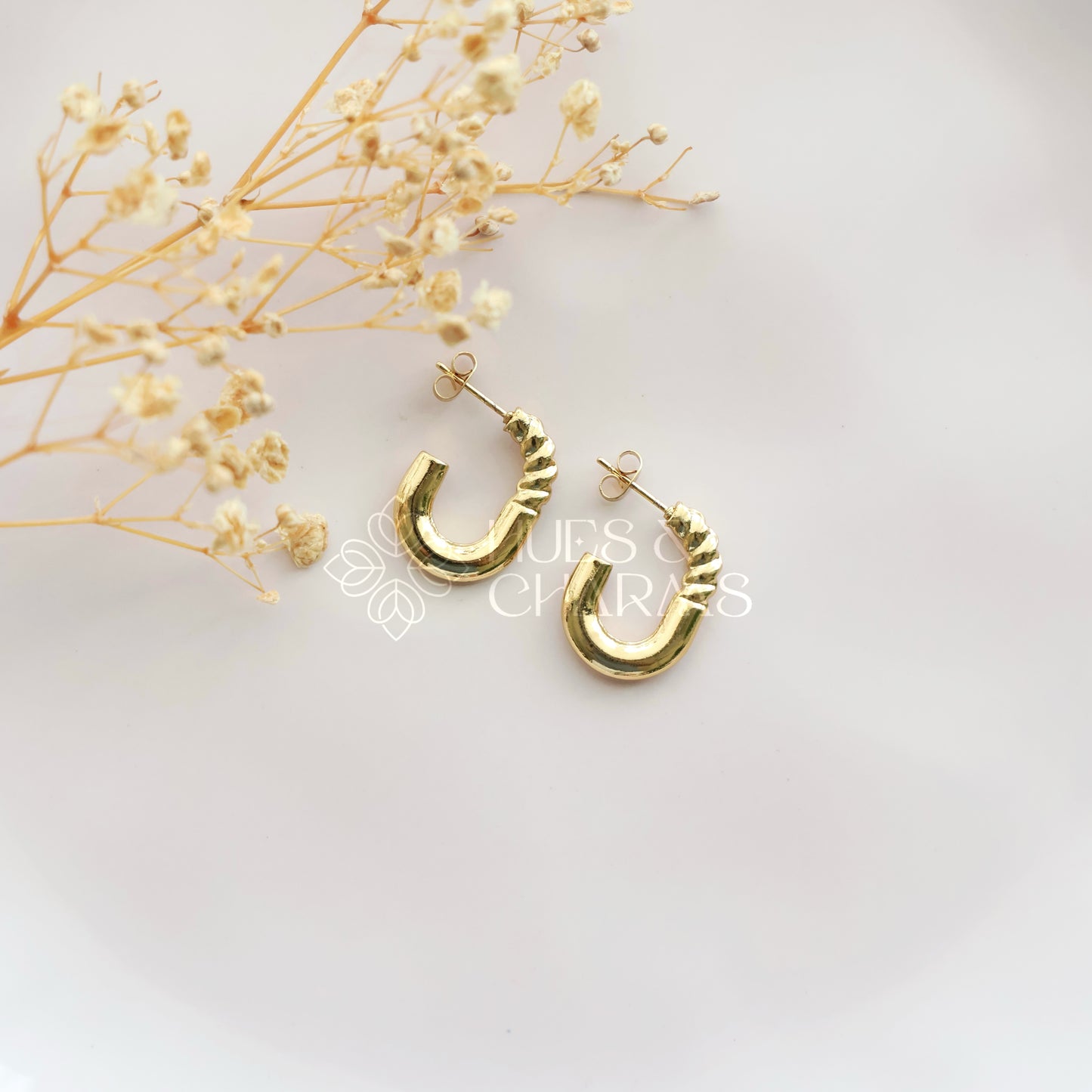 GOLDEN HALF TWISTED OVAL HOOPS