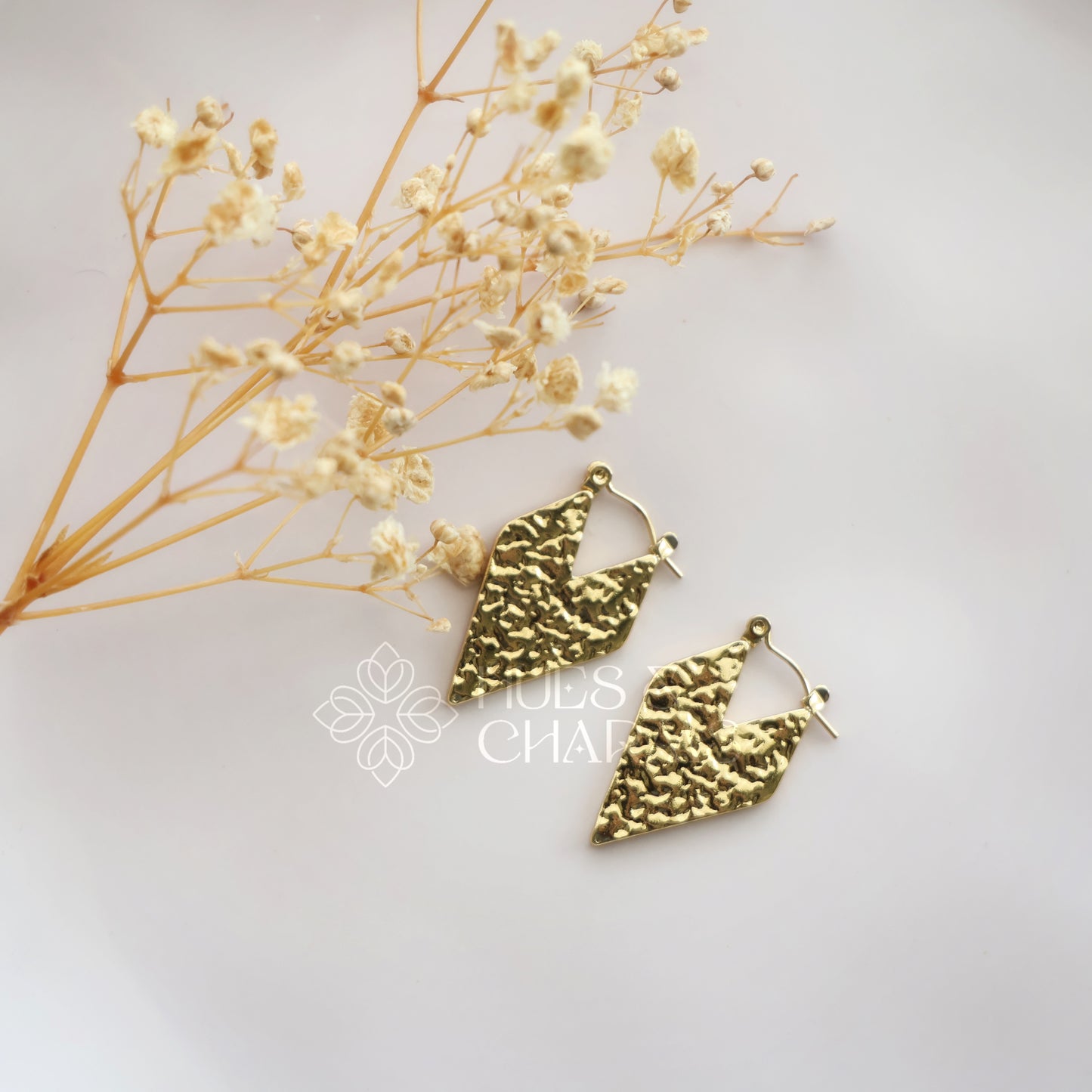 GOLDEN LONG TEXTURED HEART HOOPS