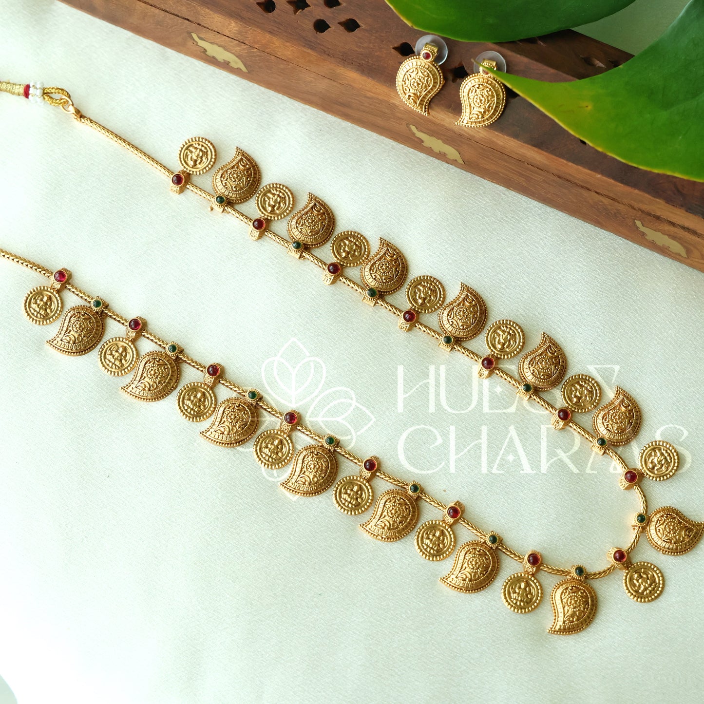 GOLDEN LAKSHMI COIN AND MANGO MOTIF HARAM SET