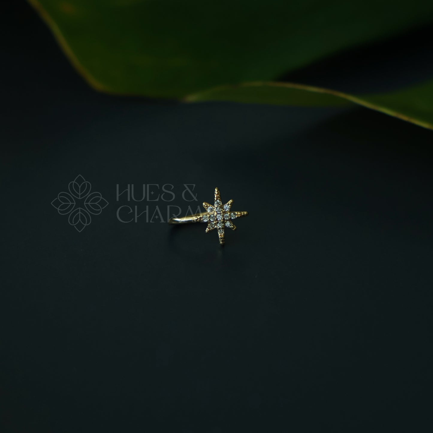 GOLDEN STARBURST AD STONES NOSE PIN