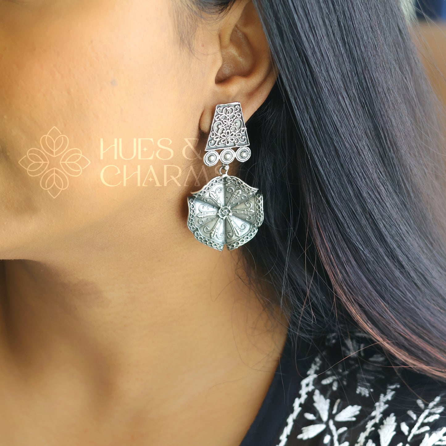 OXIDIZED TEXTURED FLORAL DROP WITH SELF DETAILING EARRINGS