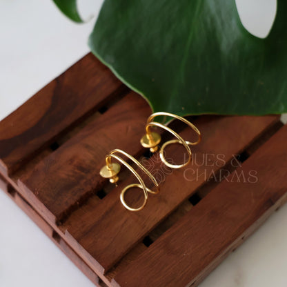 GOLDEN SWIRL HOOP EARRINGS
