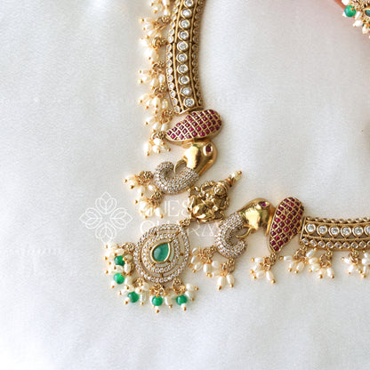 GOLDEN HERITAGE LAKSMI DETAILED STATEMENT NECKLACE SET WITH PEARLS