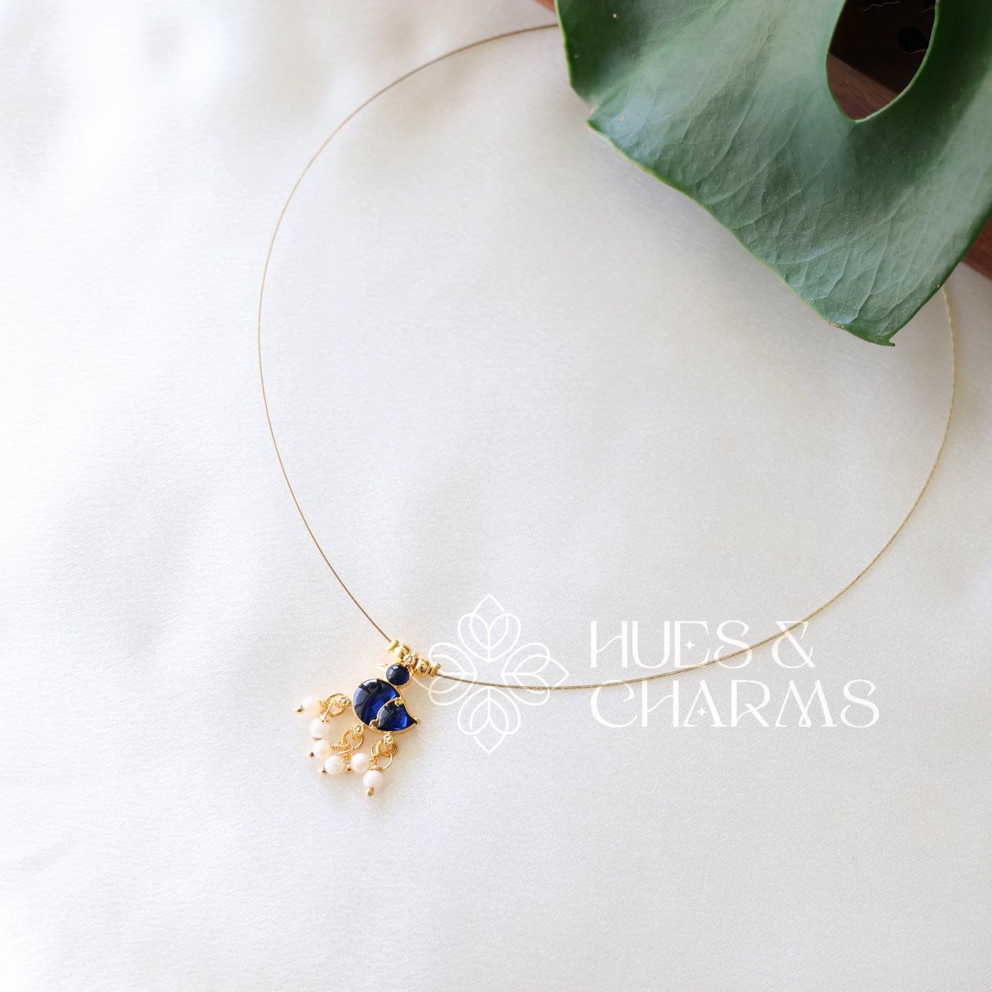 GOLDEN DUCK CHARM FLOATING NECKPIECE (COLOURS AVAILABLE)