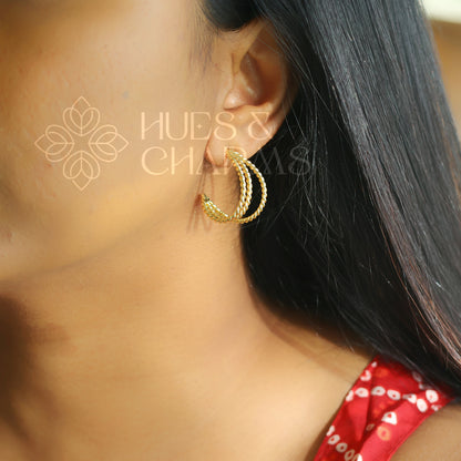 GOLDEN TWISTED HOOP EARRINGS