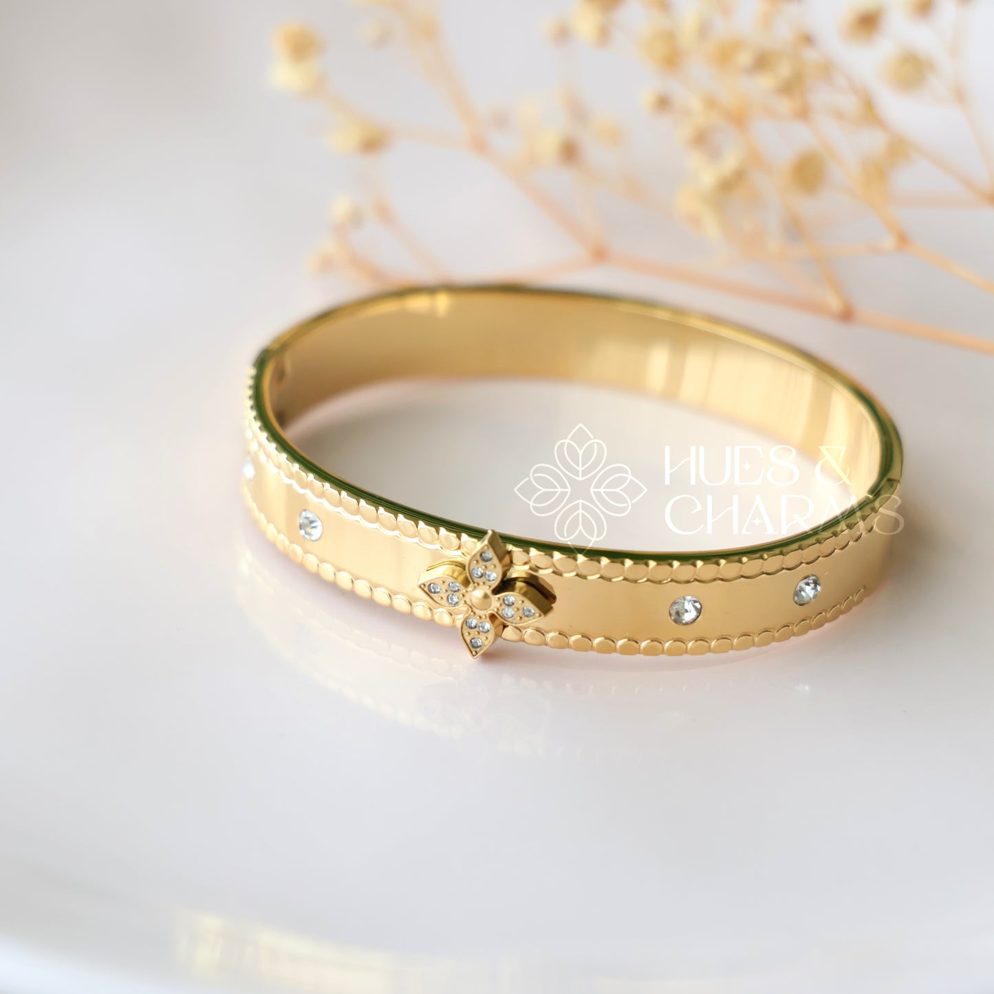 GOLDEN STATEMENT FLORAL BRACELET