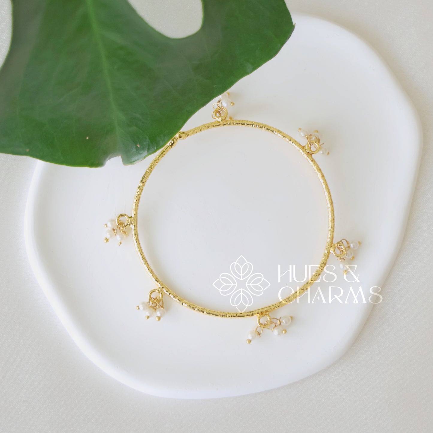 GOLDEN HAMMERED BANGLE WITH PEARLS