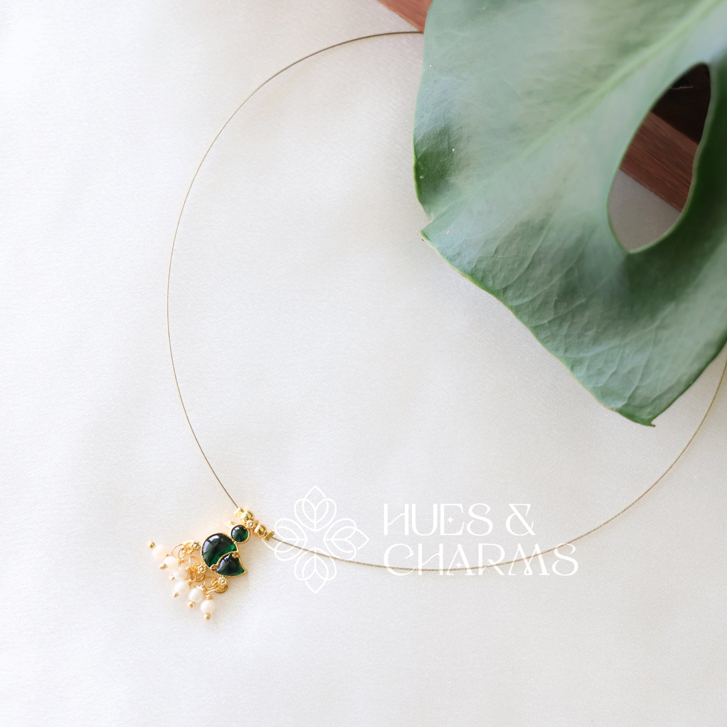 GOLDEN DUCK CHARM FLOATING NECKPIECE (COLOURS AVAILABLE)