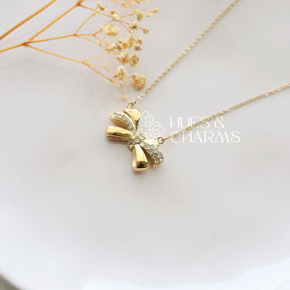 GOLDEN AD BOW PENDANT NECKPIECE