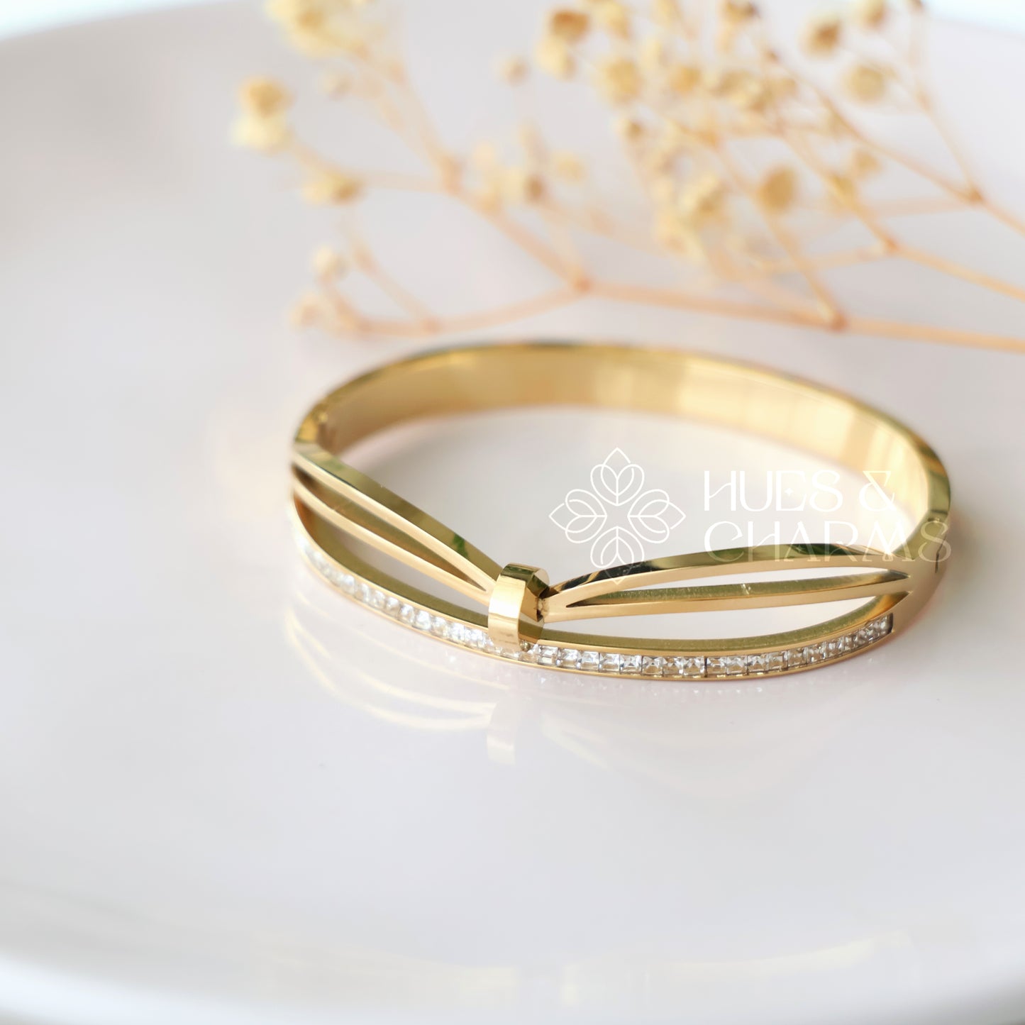 GOLDEN CURVED AD BRACELET