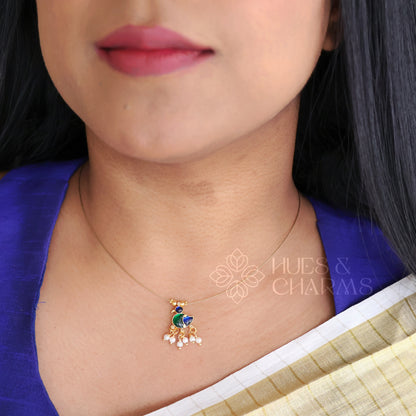 GOLDEN DUCK CHARM FLOATING NECKPIECE (COLOURS AVAILABLE)