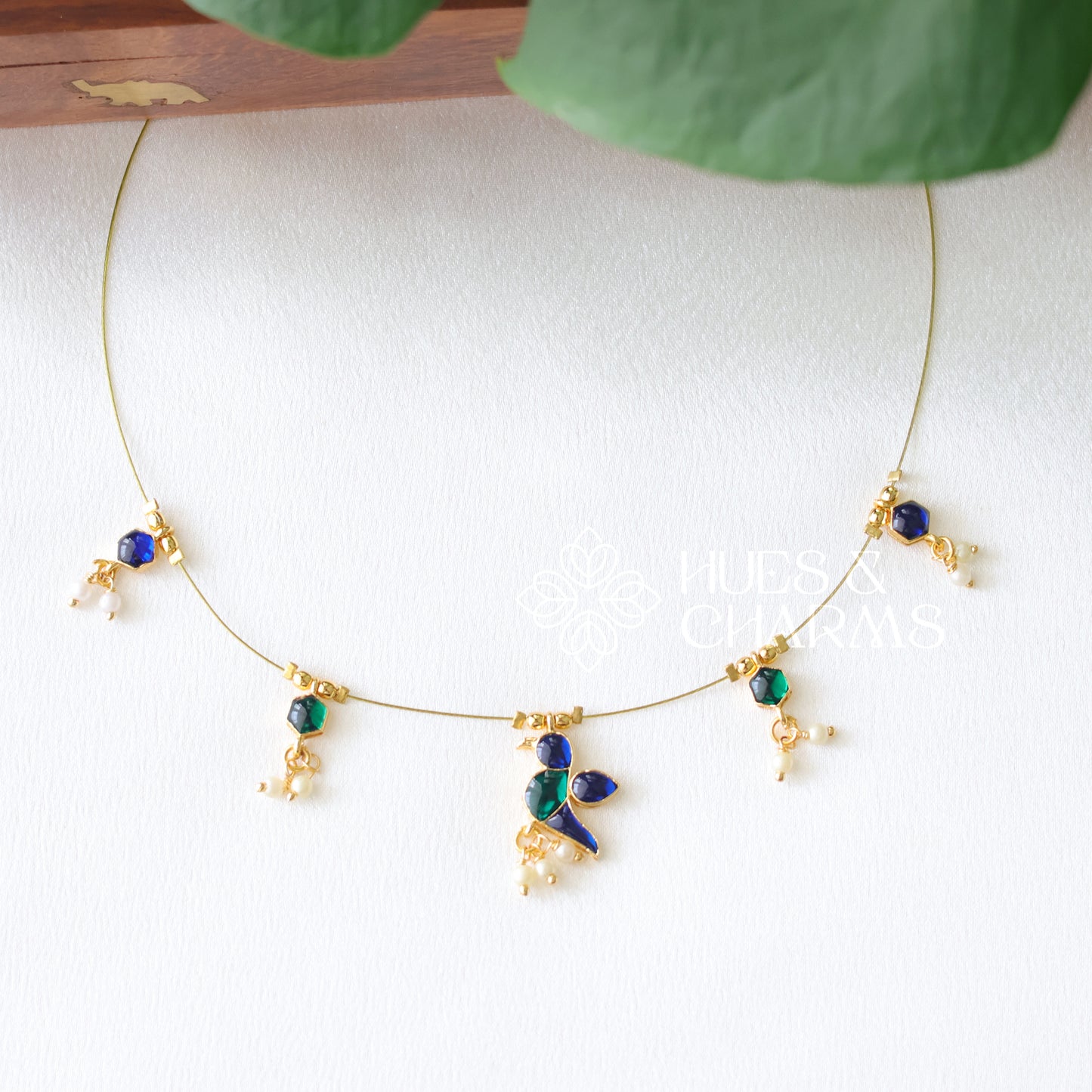 PARROT FLOATING NECKPIECE -BLUE & GREEN