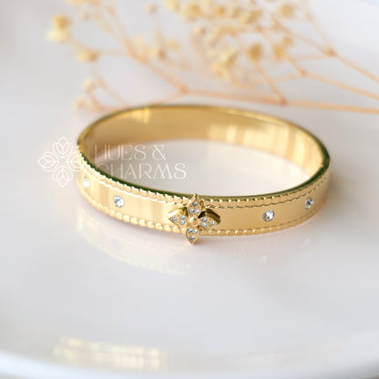 GOLDEN STATEMENT FLORAL BRACELET