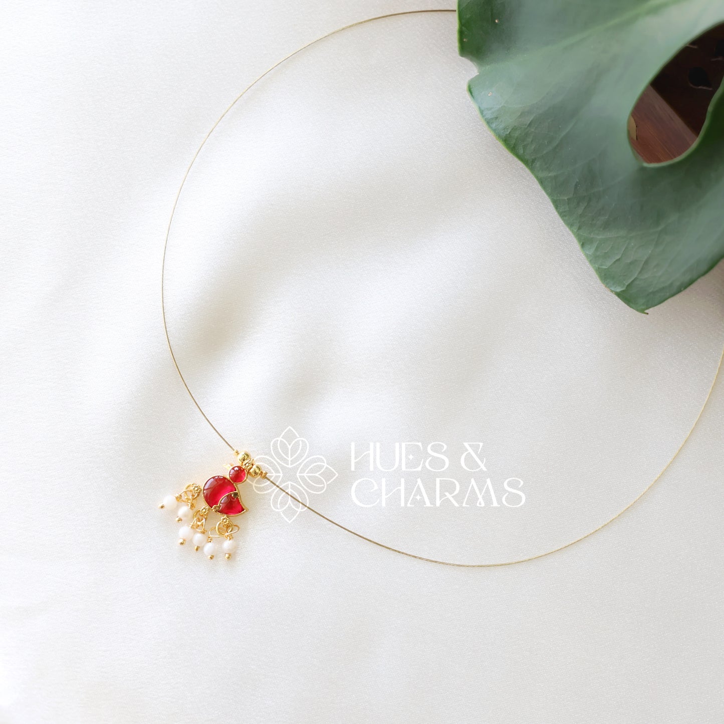 GOLDEN DUCK CHARM FLOATING NECKPIECE (COLOURS AVAILABLE)