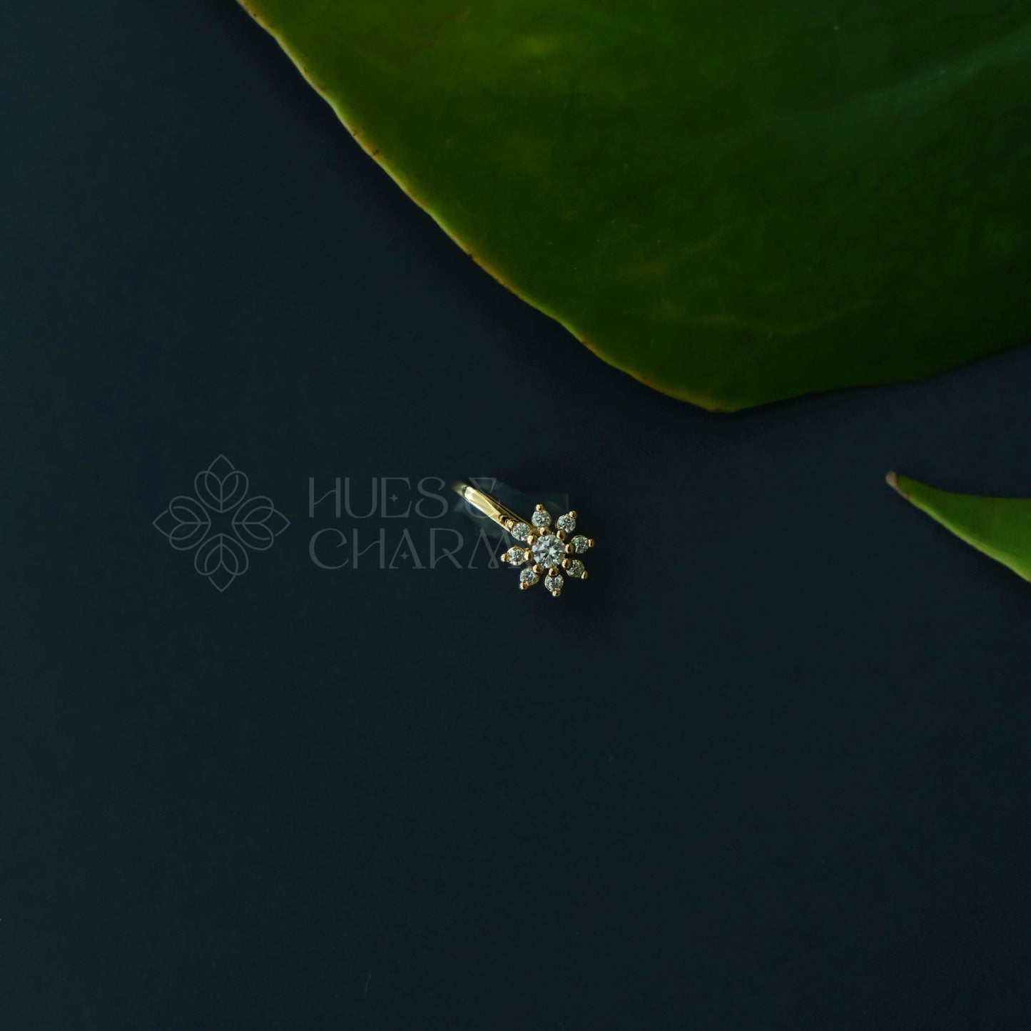 GOLDEN FLORAL AD STONES NOSE PIN