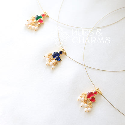 GOLDEN DUCK CHARM FLOATING NECKPIECE (COLOURS AVAILABLE)