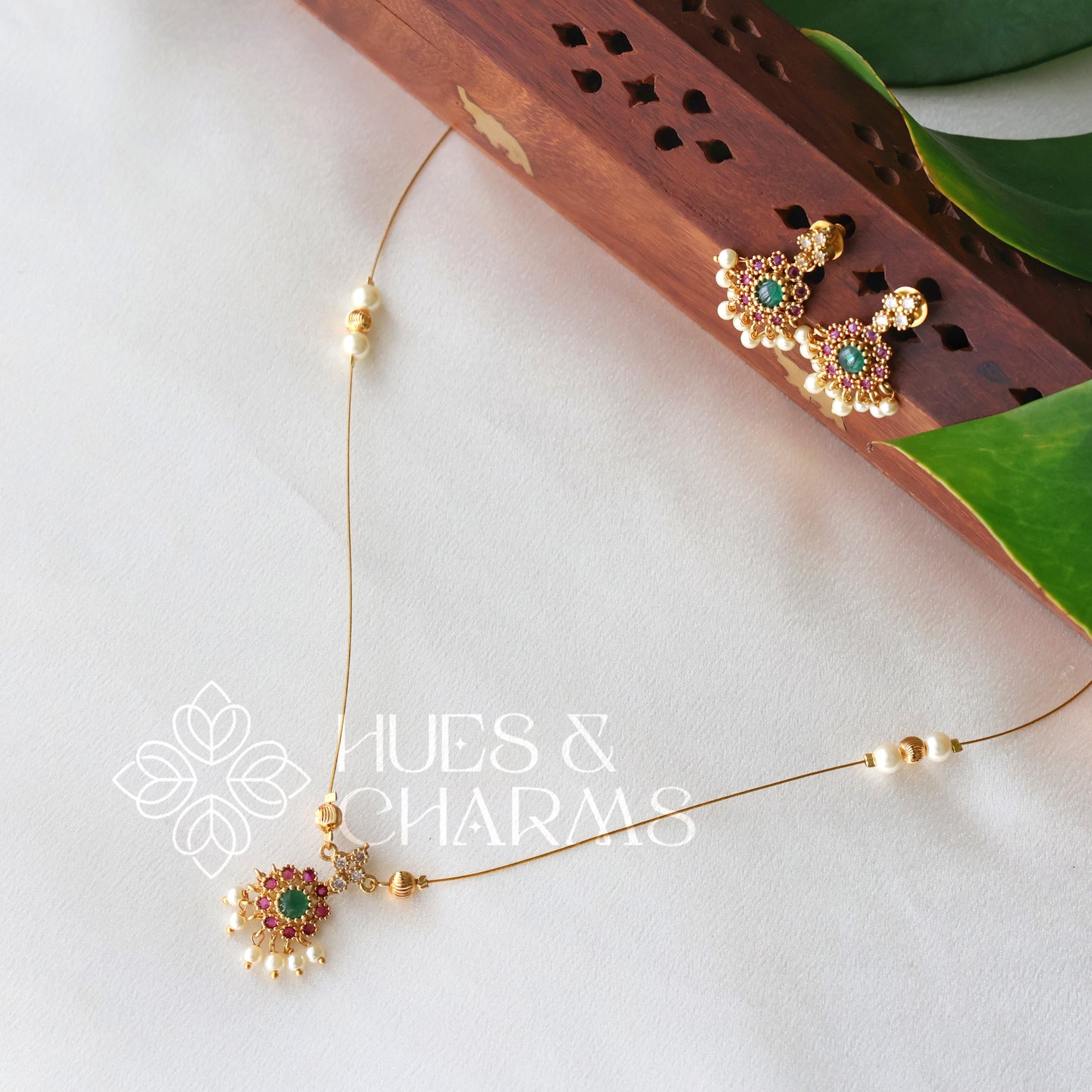 TRADITIONAL FLORAL CHARM FLOATING NECKLACE SET