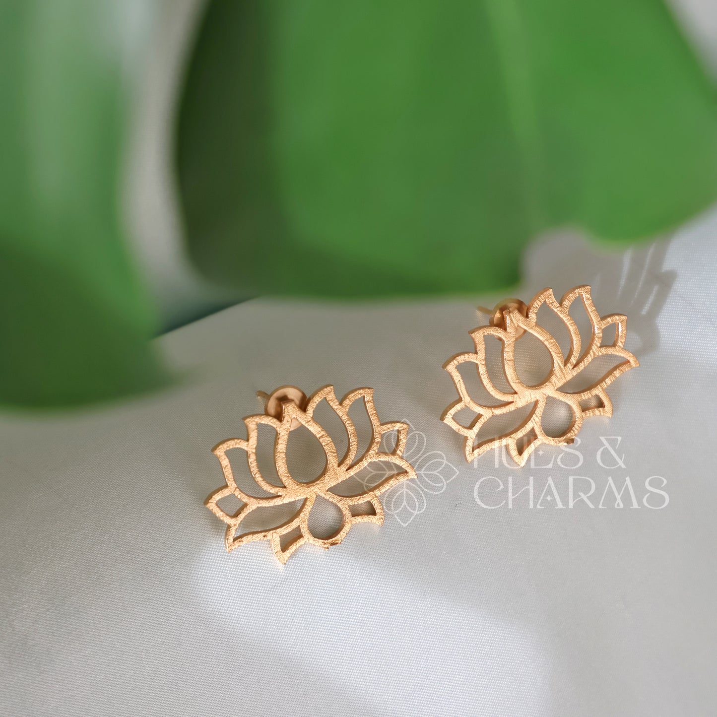 GOLDEN LOTUS FRAME STUD EARRINGS